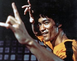 Lee in "Game of Death." Moral: don't mess with people in yellow jumpsuits. Lee in "Game of Death." Moral: don't mess with people in yellow jumpsuits.