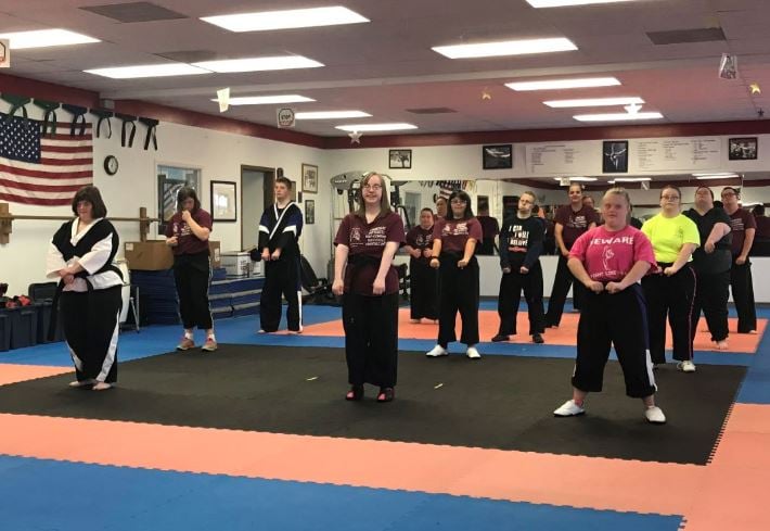 A class at St. Louis Family Martial Arts Academy. The students have Down syndrome.