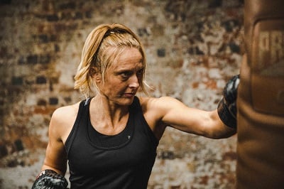 Punching a heavy bag helps tone muscle and burn fat.
