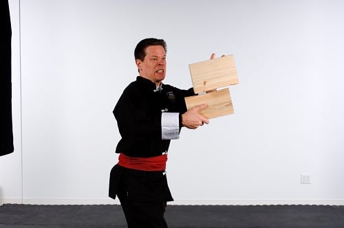 Man breaking board kung fu
