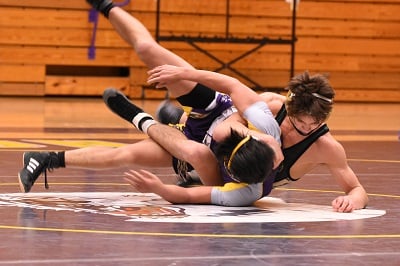 chris-chow-1133102-unsplash. Two collegiate wrestlers.