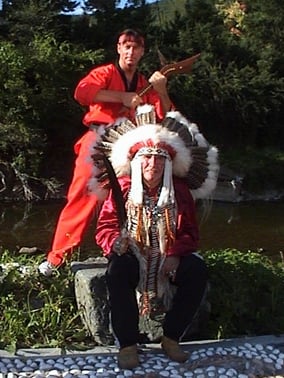 George Lépine (standing) with gunstock war club (see Okichitaw) and Vern Harper (seated) with Eagle feather