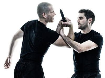 self defense arts bka pic 1 martial arts training wrist lock with plastic training knife.