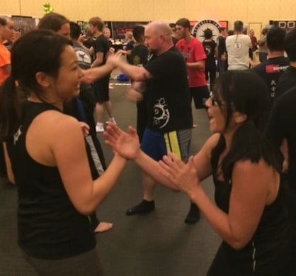 Women train Jeet Kune Do at the Martial Arts SuperShow.