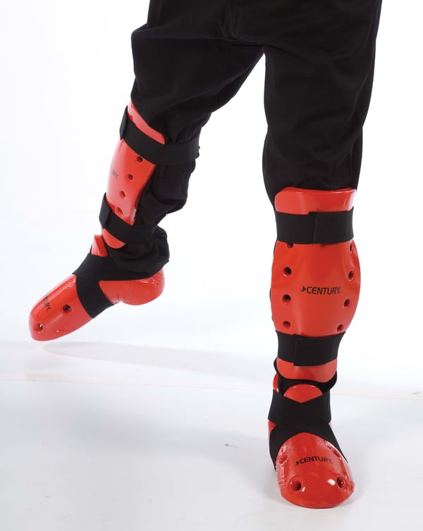 Karate shin guards and boots for sparring.