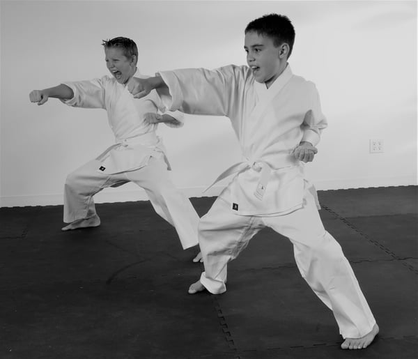 Working together to execute a synchronized kata, or form, takes teamwork and discipline, both fundamental martial arts values.