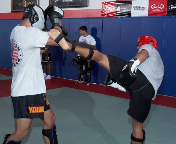 Students at American Top Team OKC practice MMA.