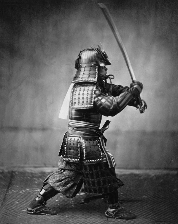 A samurai warrior wields his katana.