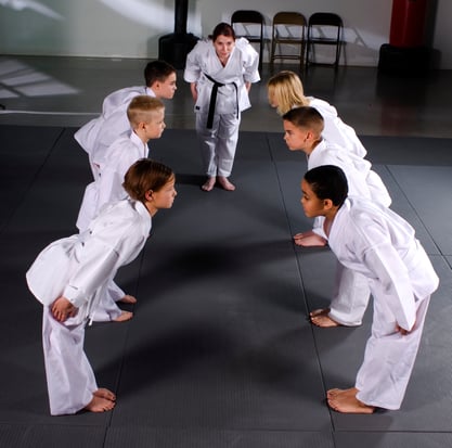 Bowing is a sign of respect in the dojo.